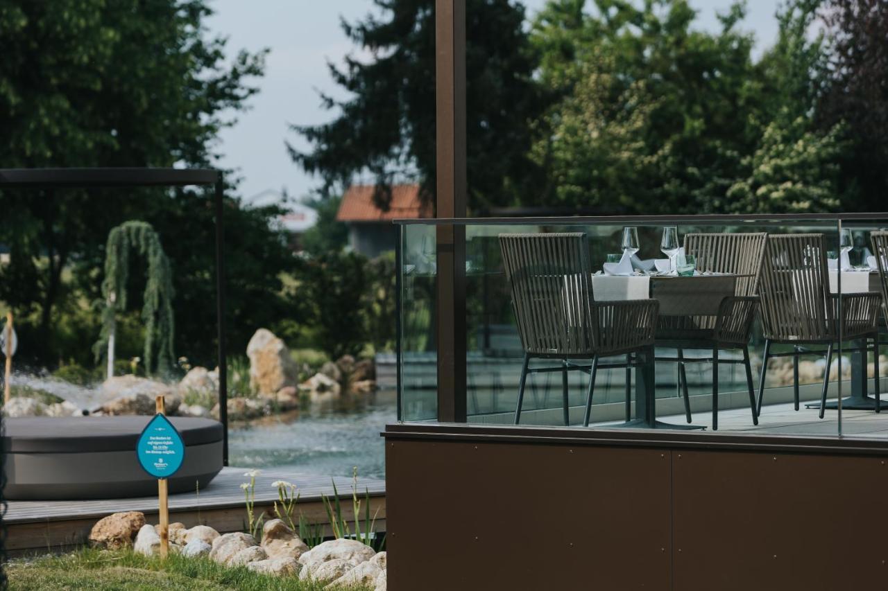 Ortner'S Resort Bad Füssing Esterno foto A glass balustrade